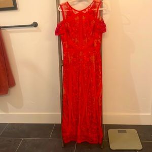 Beautiful red off the shoulder marchesa motte dress.